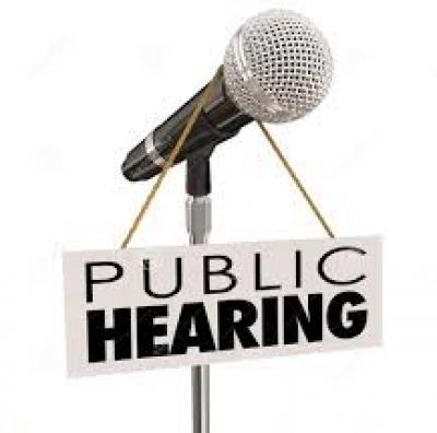 Image of microphone with Public Hearing sign