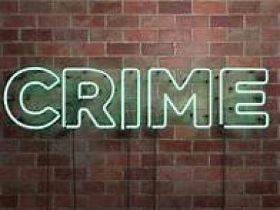 brick wall with Crime written